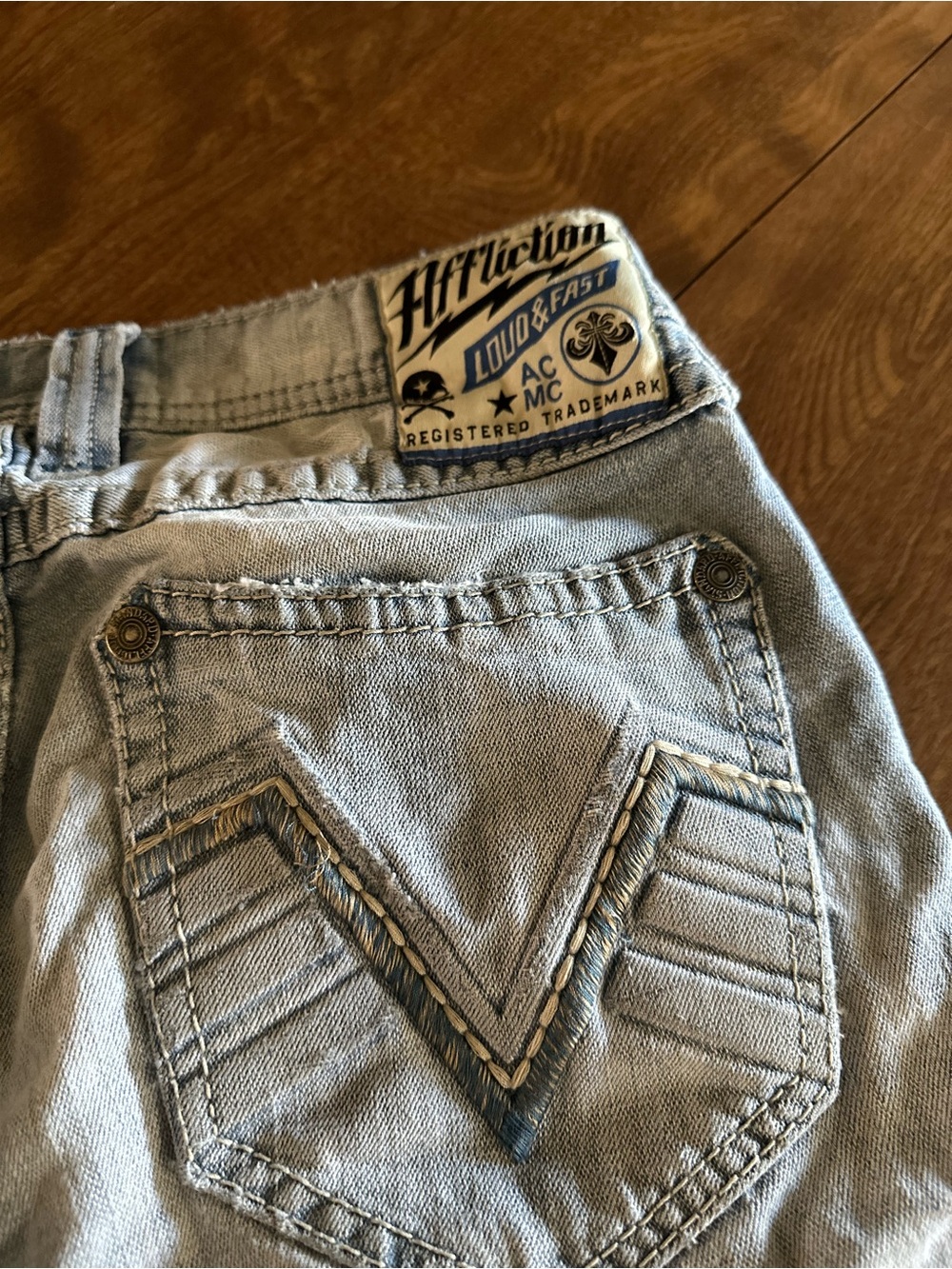 Affliction Men’s Faded Light Blue Distressed Slim Straight Jeans